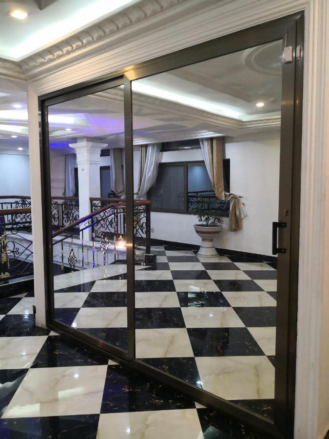 Residence Palais Du Stade Котону Экстерьер фото
